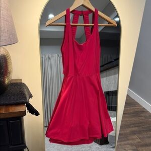 Vibrant hot pink Sleeveless golf/tennis dress with built in shorts.